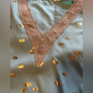 Fun Vneck top with Gold details